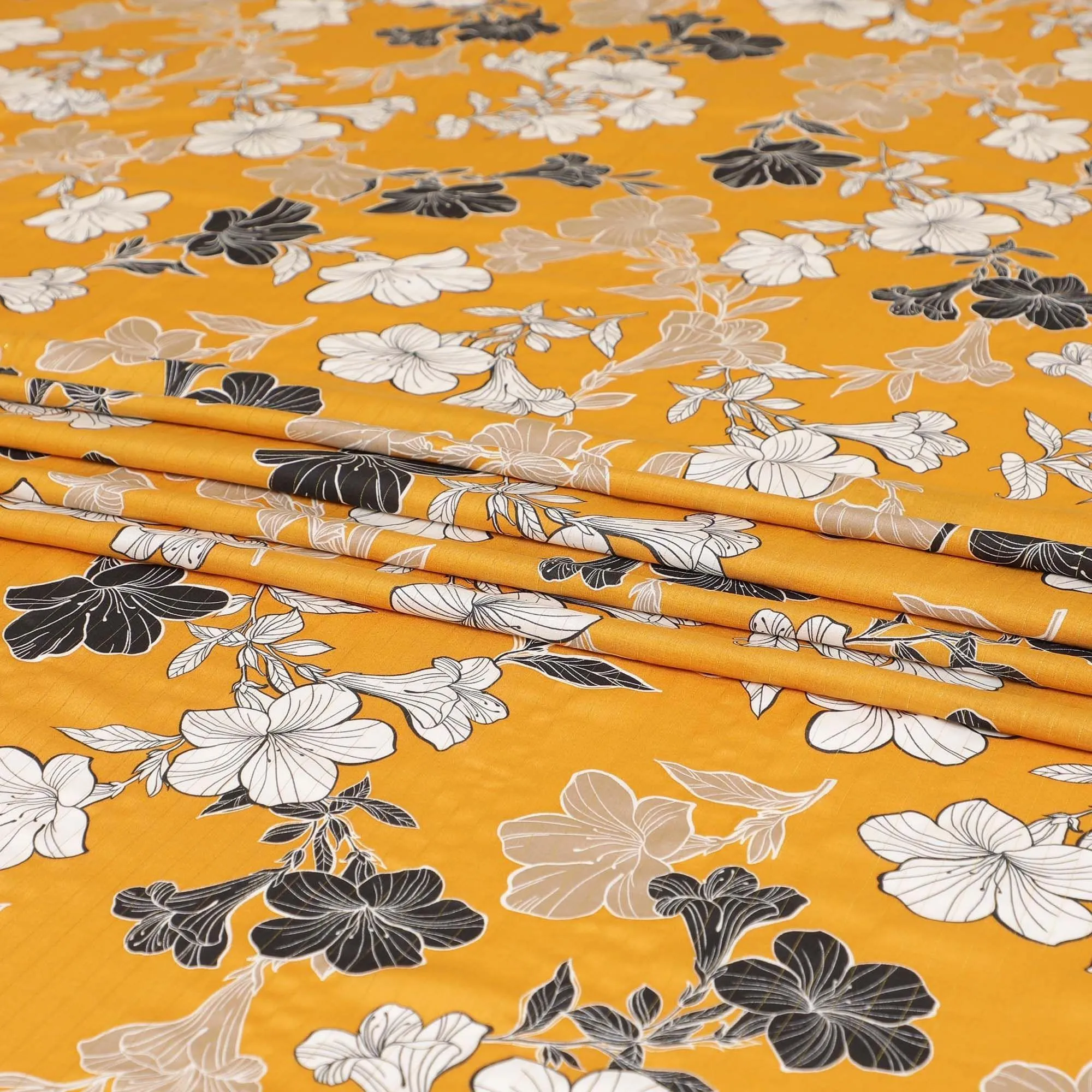 Mustard yellow Italian viscose fabric with black, pale brown and off white print having golden metallic lurex stripe in floral design-D7904