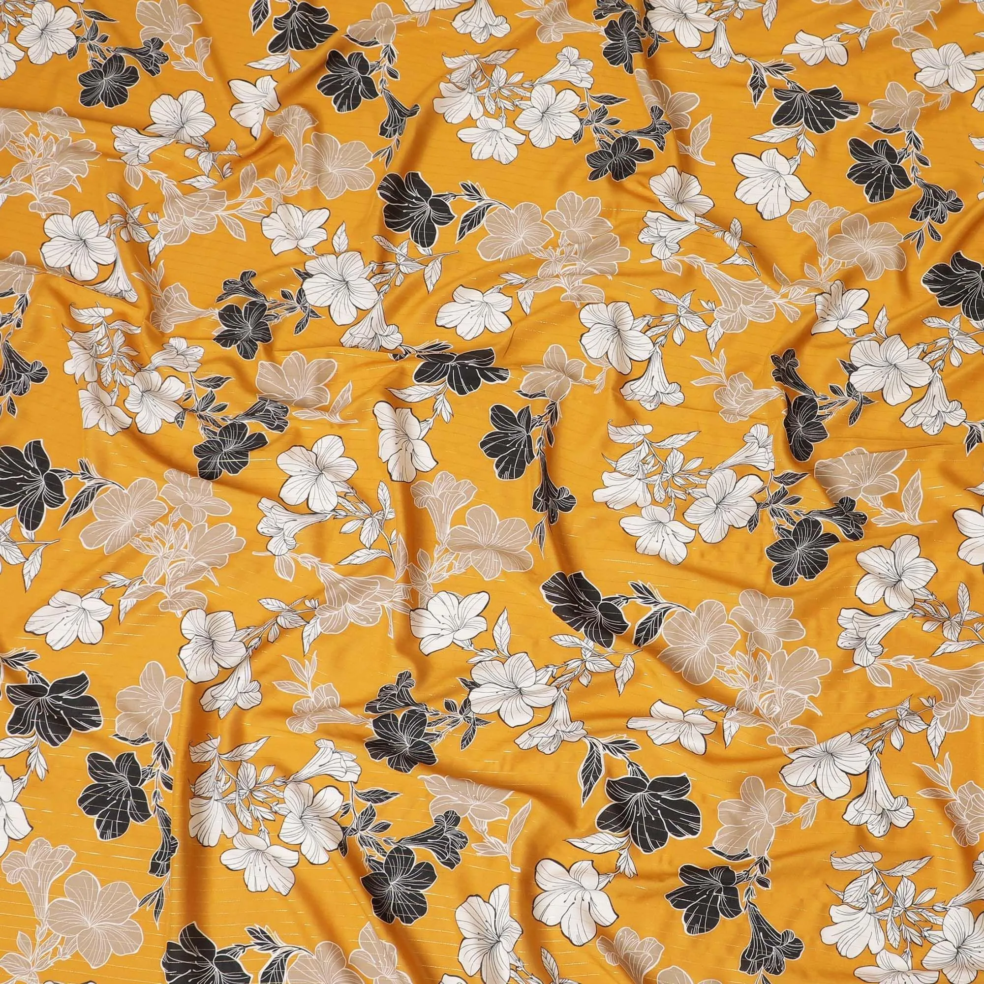 Mustard yellow Italian viscose fabric with black, pale brown and off white print having golden metallic lurex stripe in floral design-D7904