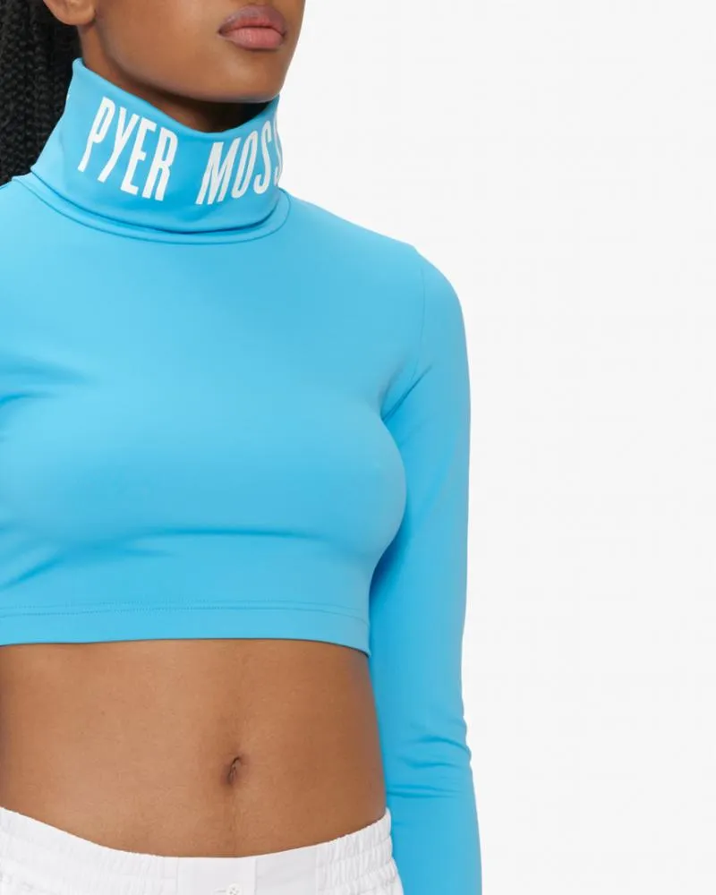 Reebok Apparel Women PYER MOSS TURTLE NECK ALWBLU