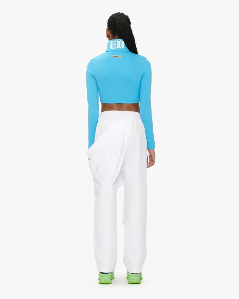 Reebok Apparel Women PYER MOSS TURTLE NECK ALWBLU